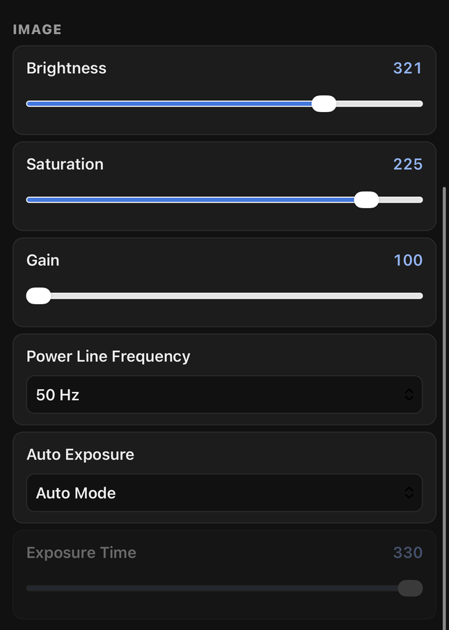 camhdmi phone panel showing auto-discovered camera controls: focus, exposure, white balance, mirror and flip
